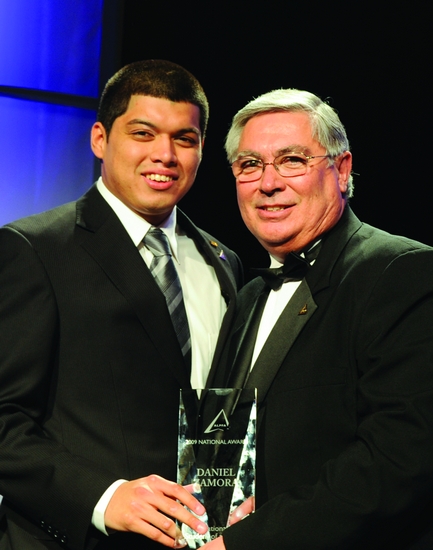Daniel Zamora and Manny Espinoza, ALPFA CEO, during the convention at which Zamora was named ALPFA National Student of the Year
