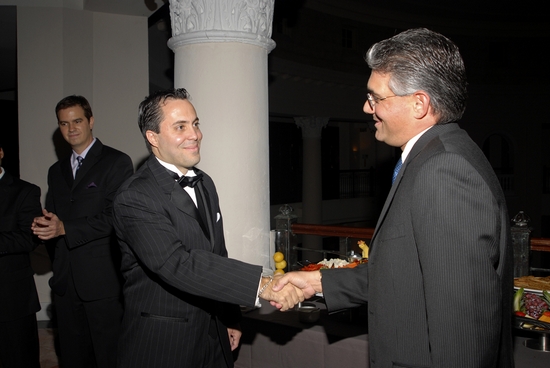 Manuel Garcia-Linares, right, past president of CACPA and president-elect of the Cuban American Bar Association, swore Ed Duarte in as CACPA president.