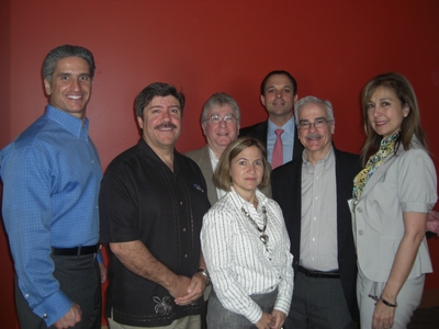 Front row, from left to right: mentors Mike Tomas, Hugo Perez, and Ana Harris; Jerome Smith, VMS; and Irma Becerra-Fernandez. Second row, from left to right: Michael Foster, VMS; and mentor Andy Perez