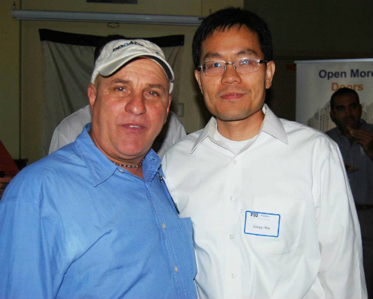 MSIRE student Albert Poledri with George Wu, assistant professor, Department of Finance and Real Estate