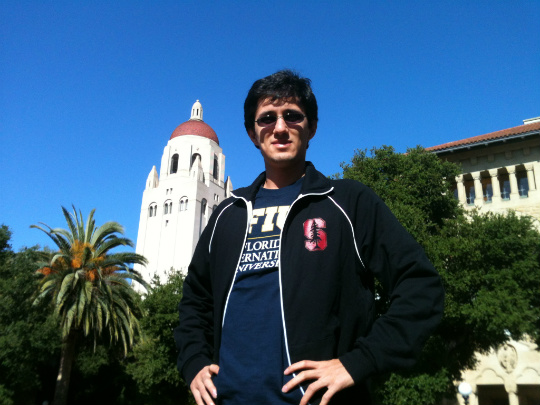 Carlos Gomez in front of Hoover Tower