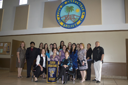 Site coordinators, representatives of the IRS, City of Sweetwater Commissioner, FIU staff and VITA volunteers at a recognition event on May 2, 2012
