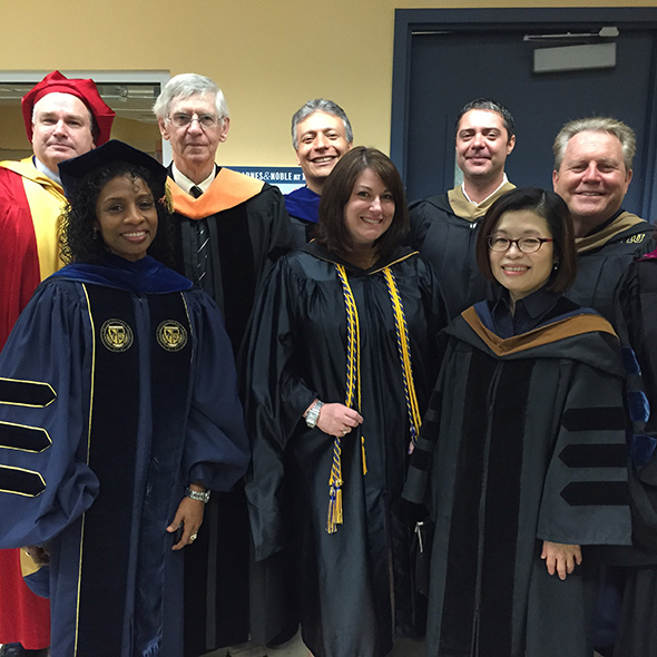College of Business faculty members (back row, l. to r.) Raymond Rody, Bruce Seaton, Carlos Parra, Gregory Maloney, Rafael Soltero (front row, l. to r) Gladys Simpson, Jaclyn Tanenbaum, Yi Ju Chen