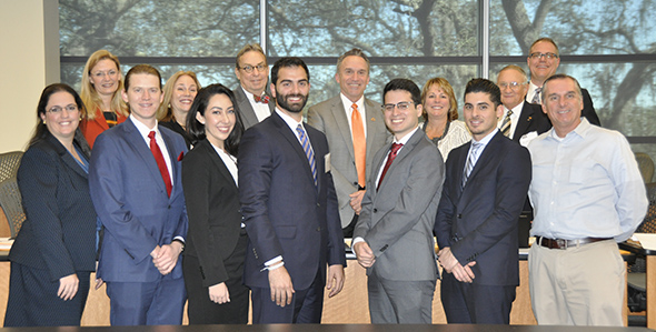 The Mercury Group with FIU staff and faculty members and case competition judges. 