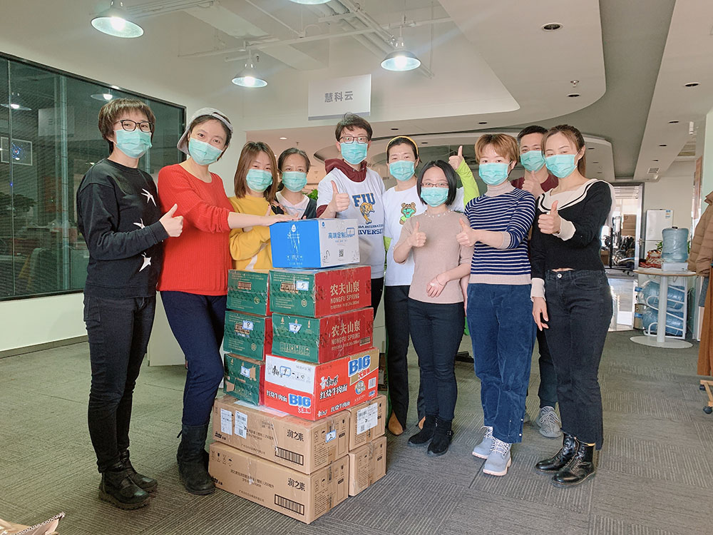 Huike Group team members In Beijing prepare shipment of masks for South Florida hospitals, 