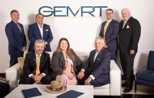 GEMRT leadership, photographed in their offices in early 2020. Standing, left to right: Leonardo Miyares, Roy Garcia, Ralph Espinosa, Mariano Rodriguez. Seated, left to right: Juan Carlos Gonzalez, Jarnette Rodriguez, Carlos Trueba.