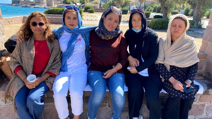 Helping to build a lifeline to a better future, FIU Business professor works with Afghan refugees in Greece.