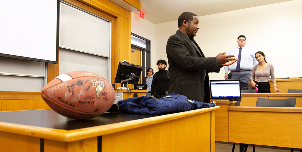 FIU Business students partnered with FIU Athletics to get Antwain footballs and jerseys